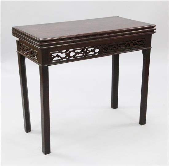 A George III triple top mahogany card and tea table, W.2ft 1in. D.1ft 5in. H.2ft 6in.